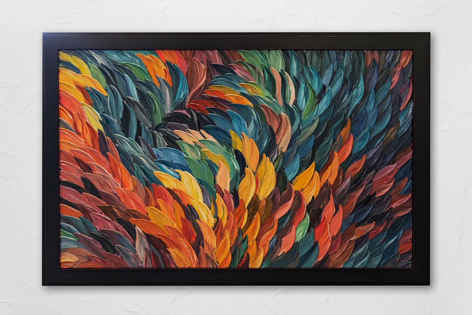 A framed abstract painting featuring a swirling pattern of colorful, feather-like brushstrokes in shades of blue, green, orange, yellow, red, and brown.