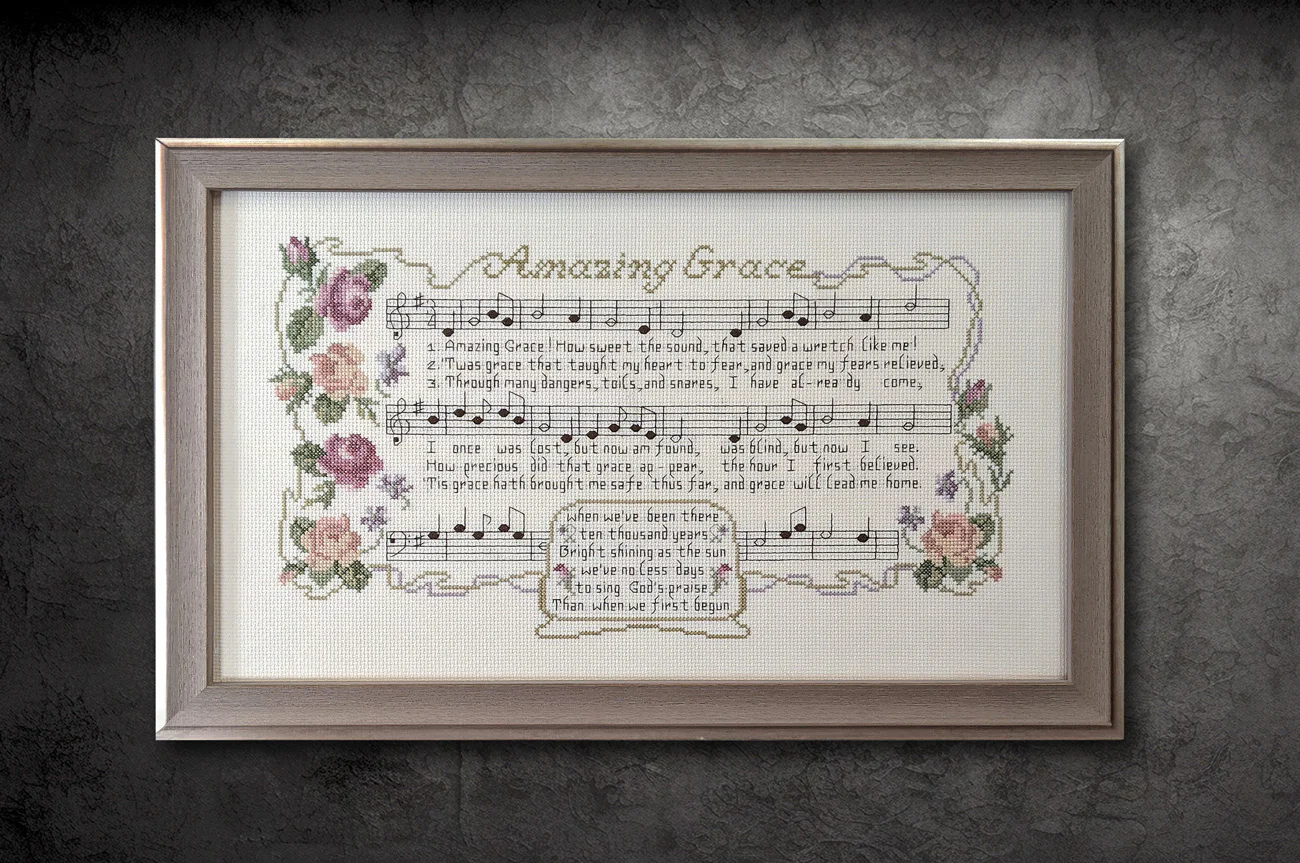 Framed cross-stitch art of the 