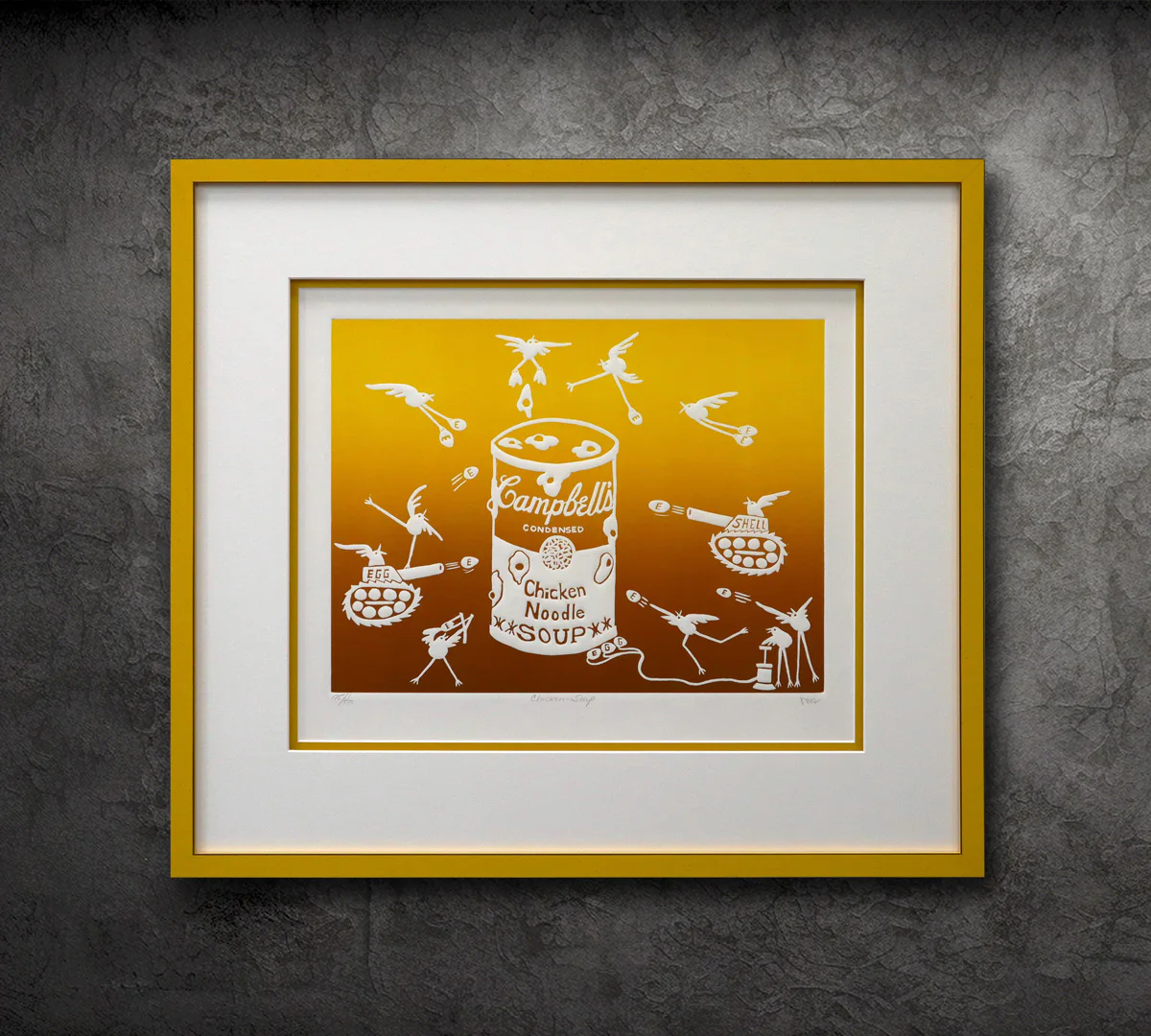 Framed artwork featuring a Campbell’s Chicken Noodle Soup can with birds, tanks, and missiles surrounding it on an orange gradient background.